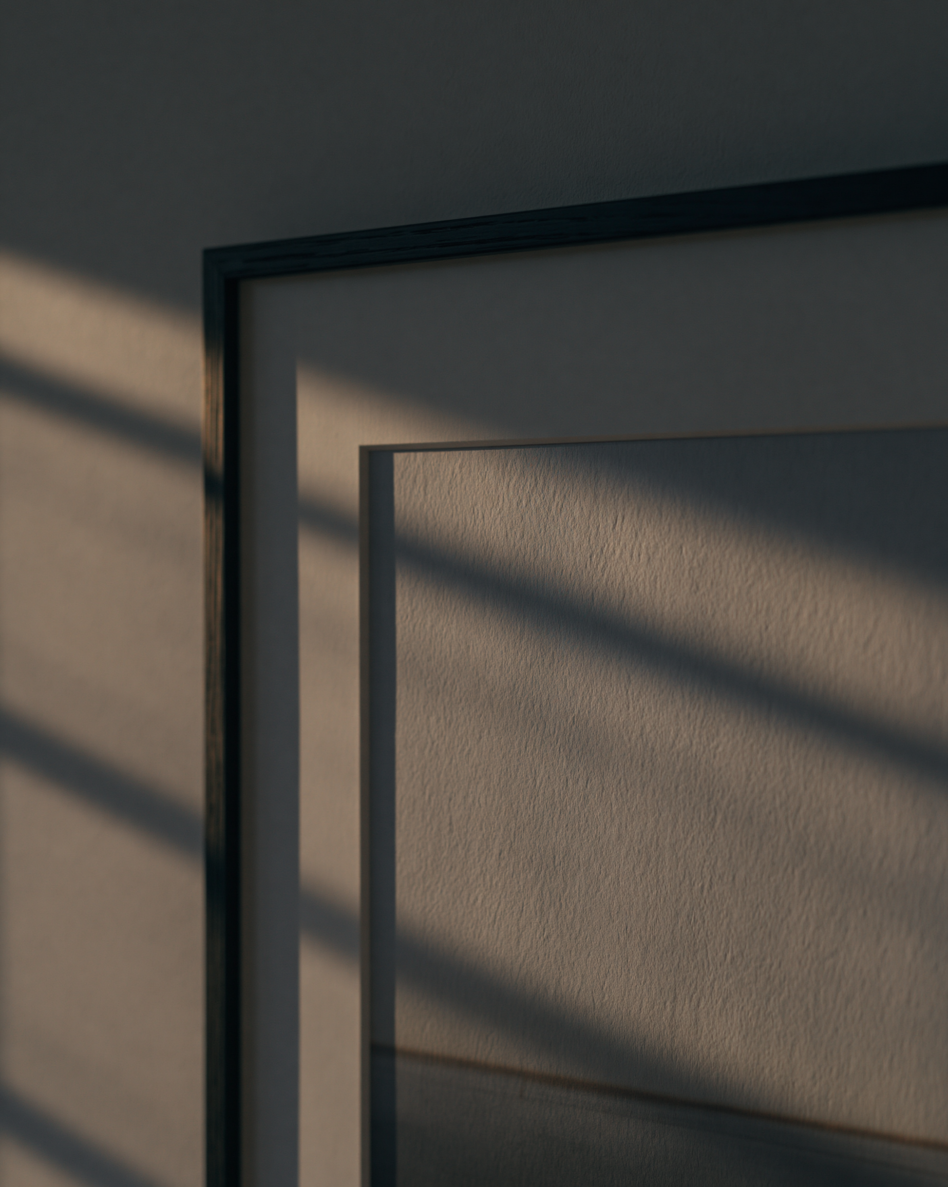 Dark-framed art print with textured paper